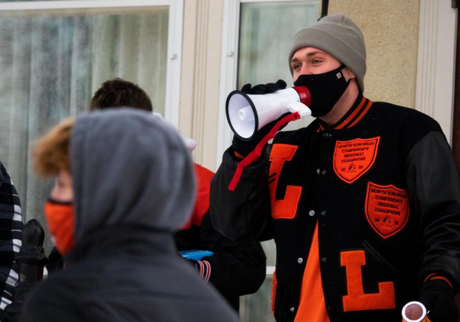 Senior Adam Pressley spoke to the group at Cook Park, aiming to unite them before marching to LHS.