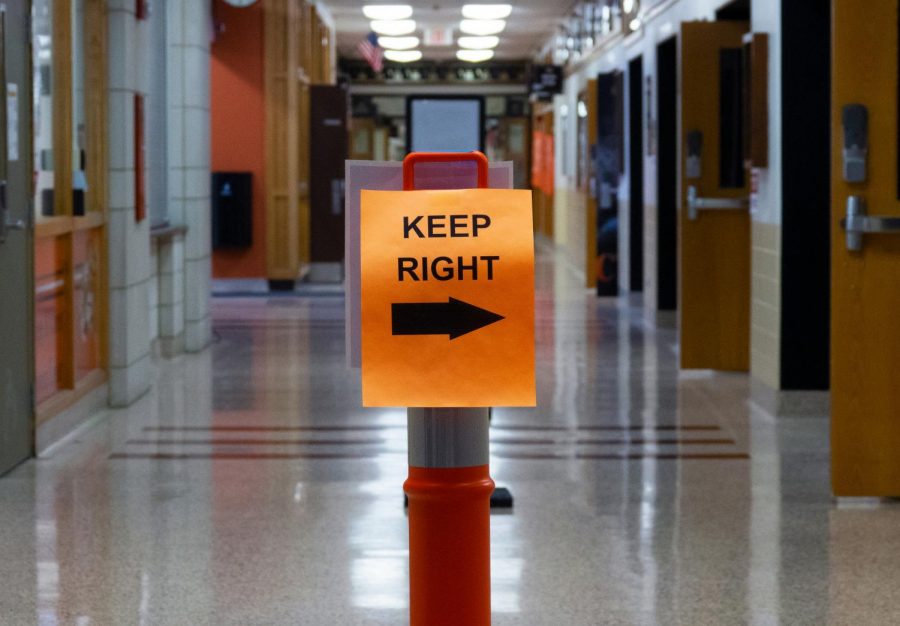 Hallways are lined with pylons, clearly marking where students and staff should walk. People must stay on the right side of the hallway to avoid coming into contact with each other.