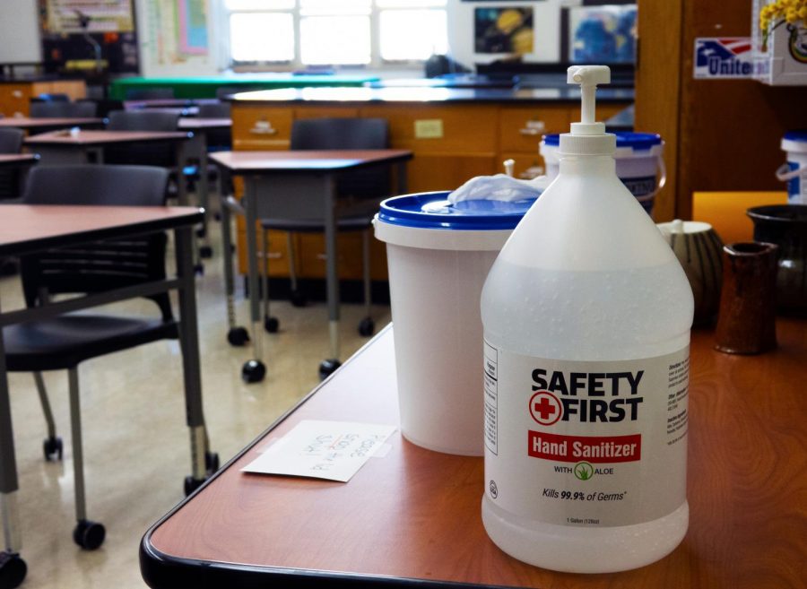 Before starting each class, students wipe down their desks and use hand sanitizer to avoid spreading germs.