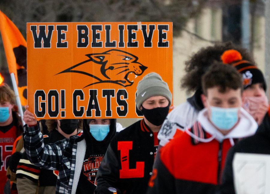 A group of about 35 LHS athletes marched from Cook Park to LHS, yelling chants such as “let us play” in hopes of drawing attention to their cause. Participants waved signs and flags during the march, catching the attention of passing cars.