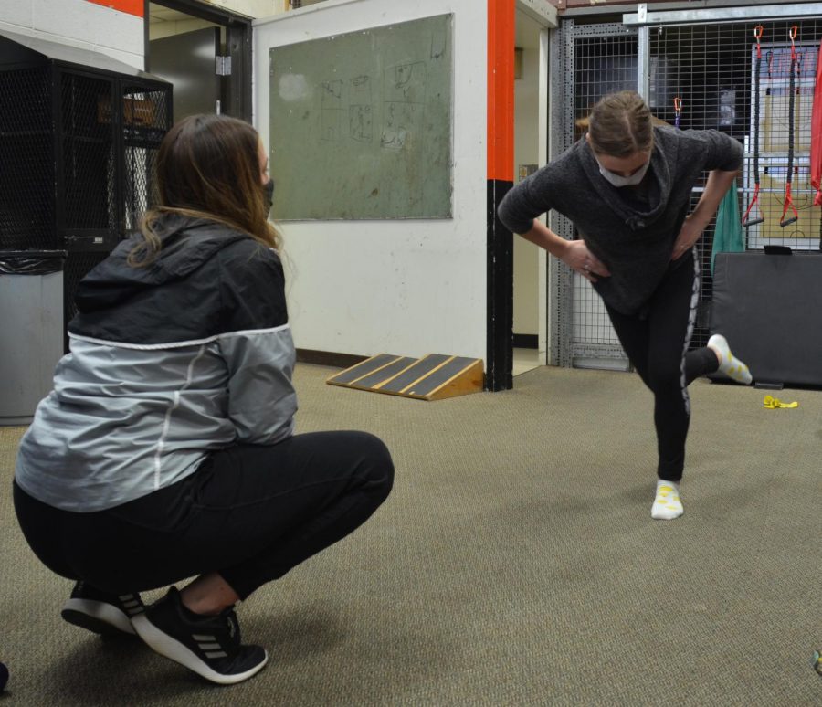 Megan Hutchins, the head athletic director, is in her first year at LHS; however, she’s been a certified athletic trainer for more than seven years. Above, she is working with Adele Wilberding, a sophomore gymnast, who has a lower leg injury. LHS trainers are in the building from 10:30 a.m.- 6:30 p.m. and are available to treat any student or staff member throughout the week.