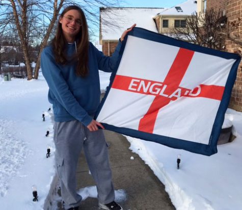 Harry Johnson immigrated from England to the US at the age of eight. He is shown holding the flag that is specific to England instead of the Union Jack which is the national flag of the U.K.