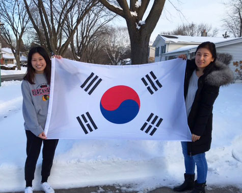 Yelim Na, a junior at LHS, holds the South Korean flag with her mom. Yelim came to the U.S. from South Korea when she was nine years old with her parents.