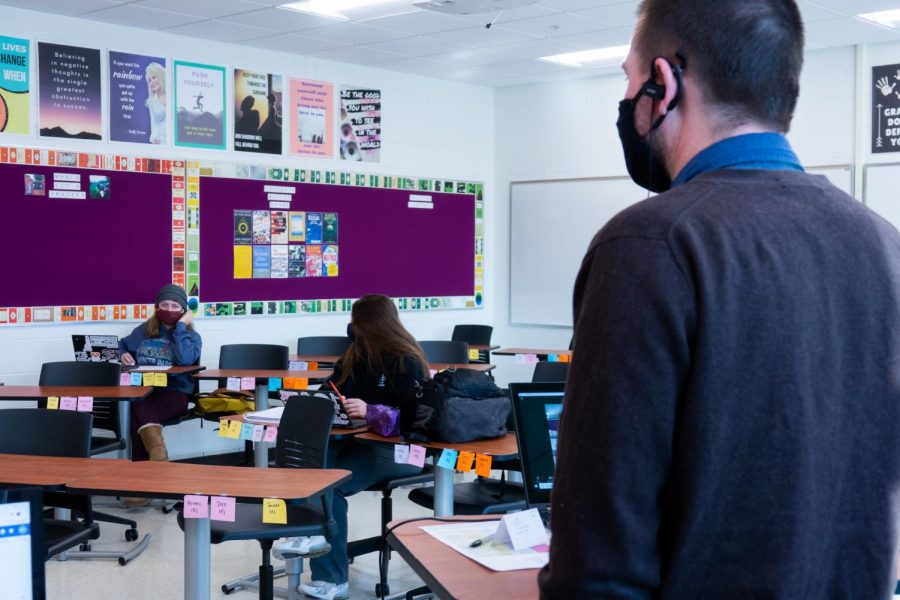 Despite sitting six feet apart, Matthew Tooley’s World Literature students hold active discussions during class.