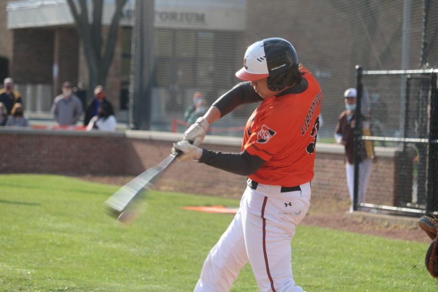 Junior Cole Collins hitting an RBI single in the 4th inning. 