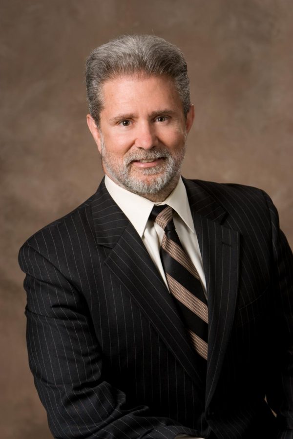 After 13 years as District 128's superintendent, Prentiss Lea is retiring on June 30. 