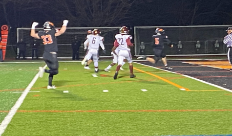 Aiden Nolan (33) celebrates as Blake Ellingson (5) runs across the goal line. Aiden Nolan (33) celebrates as Blake Ellingson (5) runs across the goal line.