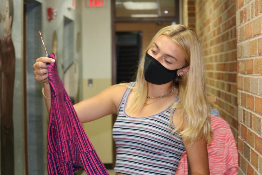 A fun and bold striped top from Urban Outfitters Hopkins loves to use for layering.