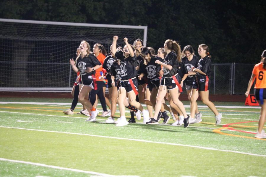 Team Black celebrates a touchdown scored by MeiLi Tompson.