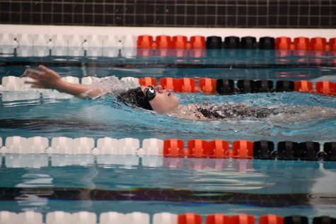 Maddie Hassert swims backstroke in the 200-yard individual medley, her strongest swim.