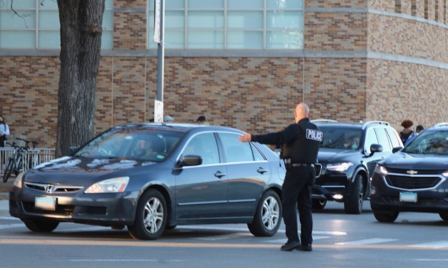 Security directs traffic to maintain an orderly environment.