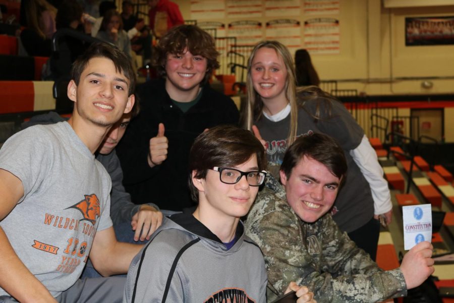 Students participate in the protest and spend their time in the Main Gym. They chose this option over returning home or putting on a mask to go to class. Back row, left to right:  Freshman Sean Criel, junior Caleb Christensen, sophomore Emilie Bissing. Front row: Junior Zachary Gay, junior Colin Tippet. 