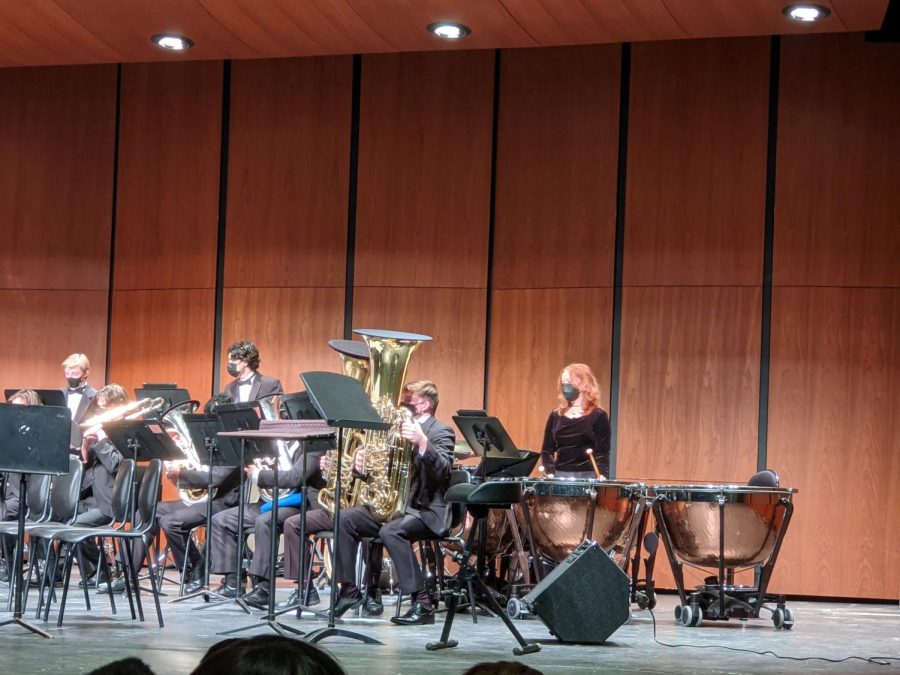 Freshman Nina Landvick, playing with the symphonic winds, carries the beat on the typonany drums. Landvick is also the only female percussionist in LHS’ band.