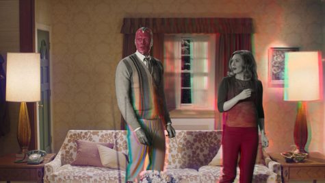 (Courtesy of Walt Disney Pictures) 
Vision (Paul Bettany) and Wanda Maximoff (Elizabeth Olsen) look around, bewildered, that their life is changing right before their eyes. 