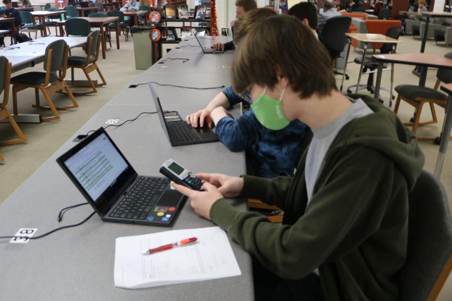 Charles Verkoulen, junior, chooses to spend his class time in the library after being granted a RAD day, an opportunity to complete his work outside of class at his own pace.