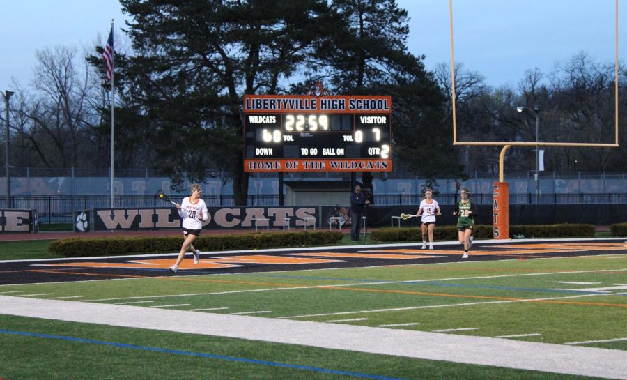 Looking for an open teammate, Kaeden Theobald, senior, tries to connect or even get in to get a shot on goal.