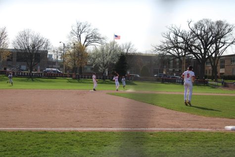 Andrew Sellers catches a pop fly at 2nd for an easy out.