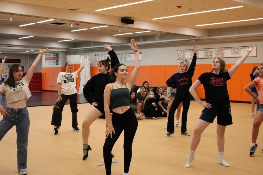 The featured dancers strike a pose during “Shakin at the High School Hop.” They learned and performed extra choreography that requires jumps, high kicks, and all around movements.