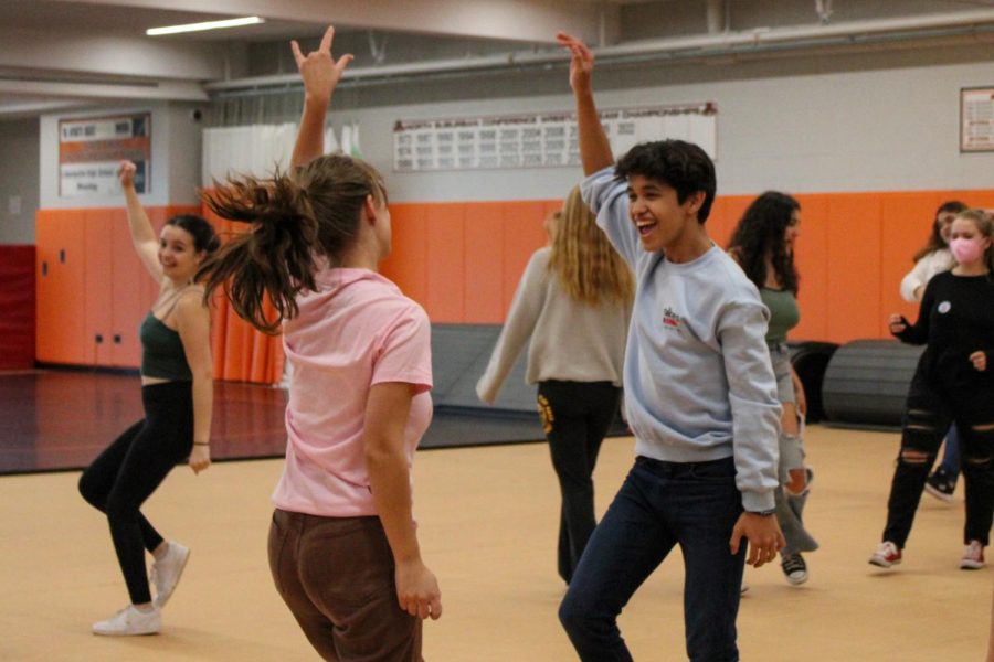 Seniors Cris Montero and Izzy Rudolphi go all out during practice. Rudolphi is starring as the sarcastic leader of the Pink Ladies, Betty Rizzo, and Monetero as the charismatic lead Danny Zuko