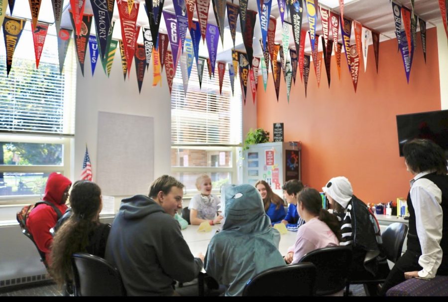 A group of students discuss their post graduation plans. The CRC is a safe place for students to talk about their future. The teachers that work in the CRC are there to help these students find their ideal future. 