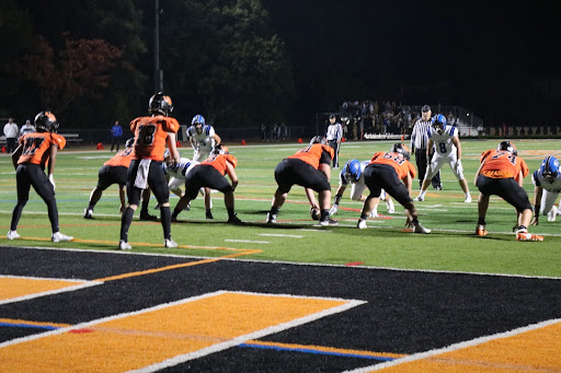Players on both sides prepare for the next snap, during a heated showdown between the Lake Zurich Bears and the Libertyville Wildcats.