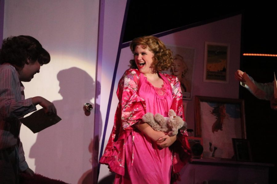Sophomore Rosie Wagner, who plays Marty, sings ‘Freddy My Love’ to showcase her affection for her Marine beau as she explains to the Pink Ladies how to write a love letter.