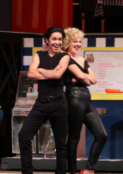 Seniors Sophia Rynes and Cris Montero play Sandy Dombrowski and Danny Zuko in “Grease” which is a combination of the 1972 Broadway musical and the 1978 movie rendition.