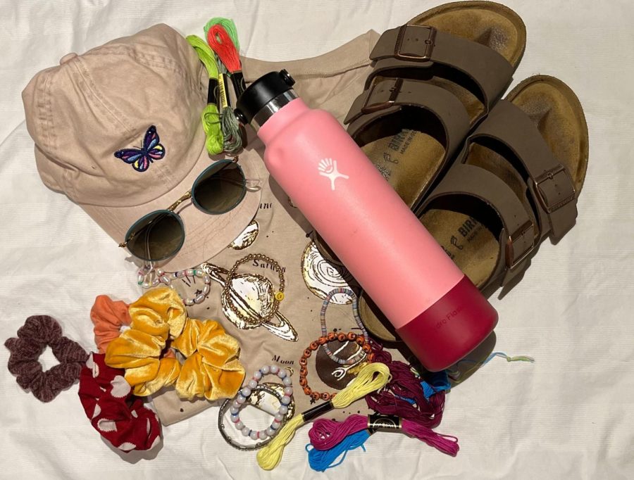 Items commonly associated with the “VSCO'' girl aesthetic. The VSCO girl aesthetic became popular on TikTok in the summer of 2019, due to videos both romanticizing and criticizing the style. The aesthetic has an “I woke up like this” look, that consists of oversized shirts, Hydro Flasks, and messy buns tied with scrunchies.