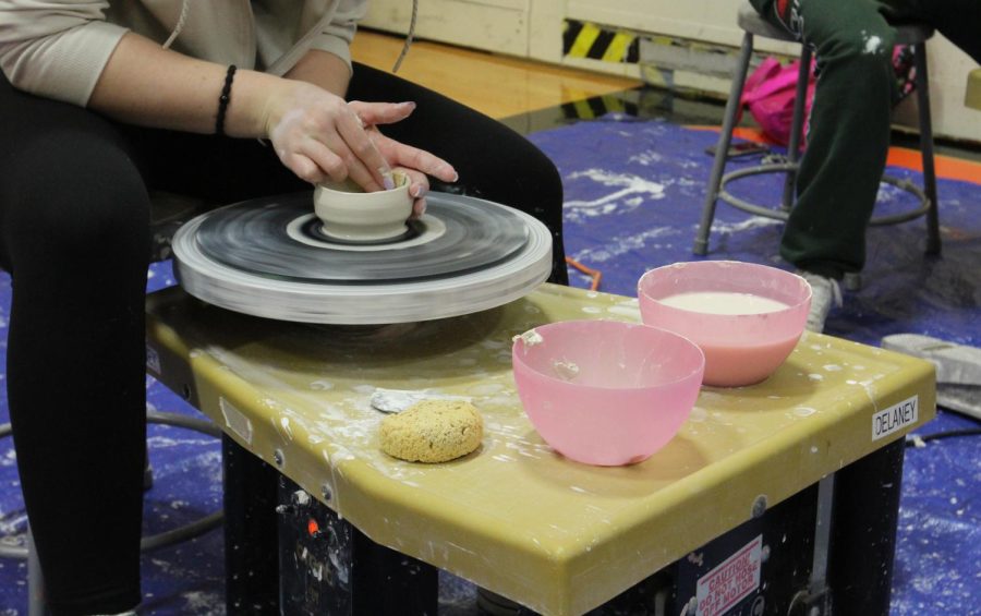 Students show their crafting skills by creating bowls in front of a live audience. This display of pottery is one of the many “live” exhibits at the show. 