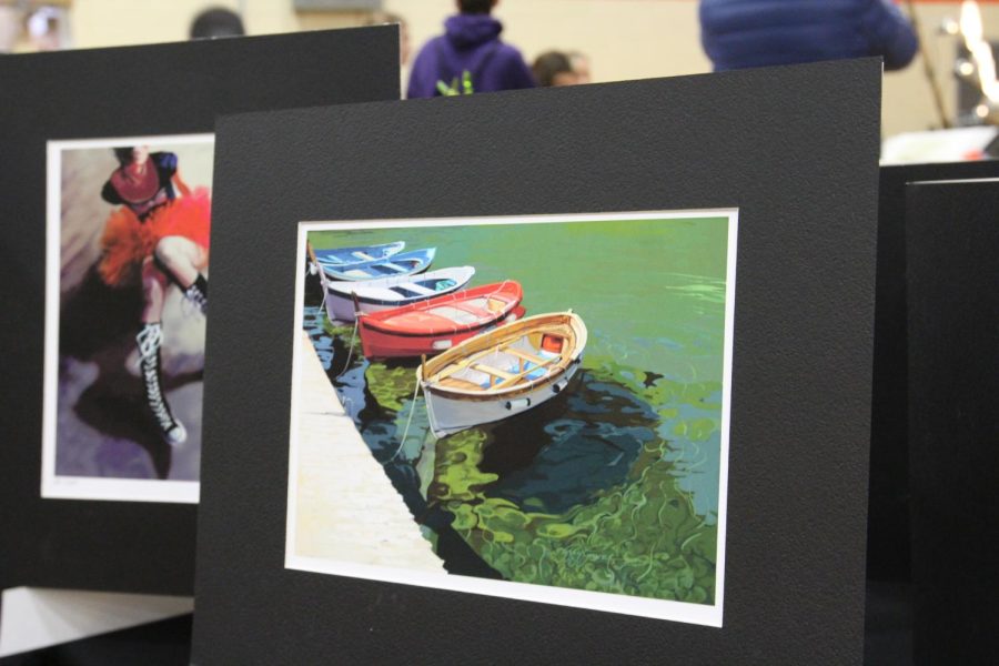 Digital art print is displayed for sale, including this piece which was created by art teacher Mr. Gossell. 