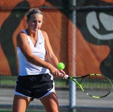 Senior Margaret Forkner tracks the ball and prepares to crush it with her backhand. Forkner is committed to Lehigh University, a Division I school in Bethlehem, Pennsylvania to pursue her tennis career after four years on varsity.