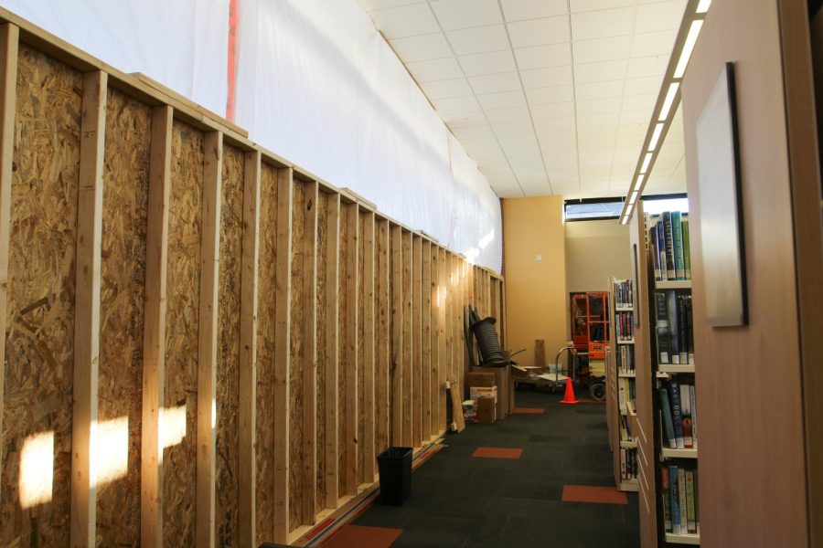 Cook Library’s Fiction room is boarded up due to window and frame replacement. The new upgrades will provide more insulation during colder months and continue to illuminate the library. 