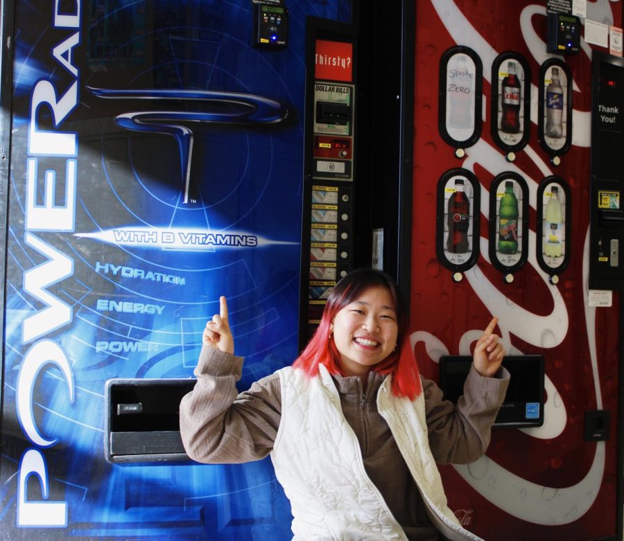 Powerade and Coca-Cola vending machines sit atop the stairwell by room 2100.
