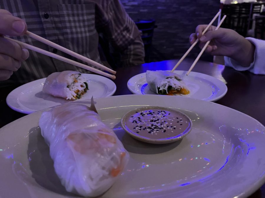 The Fresh Spring Roll is an appetizer with a variety of vegetables and rice noodles. It comes with a sesame dipping sauce.