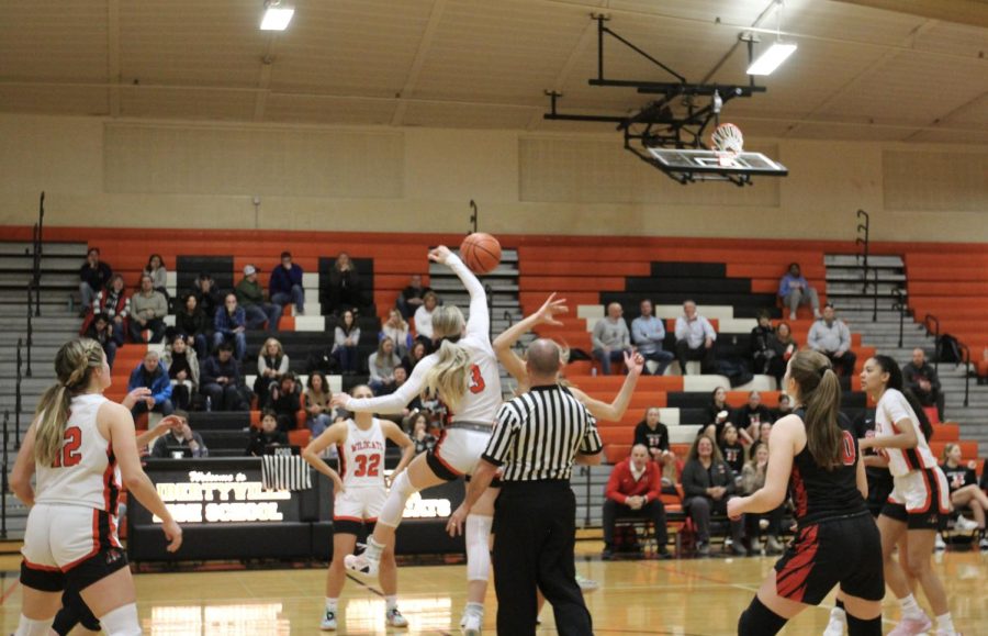 Senior Emily Fisher (3) a Maryland commit wins the tip-off for her team, setting the stage for an exhilarating game. The Cats primed themselves for a tough game against the Maine South Hawks.