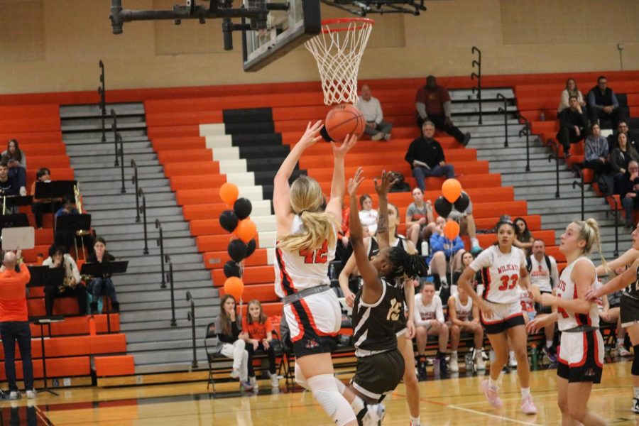 Junior Maddy Kopala (42) was a crucial part of the Wildcats’ turnaround in the second half with her strong defense against the Corsairs’ leading senior, Jordan Wood (13). 