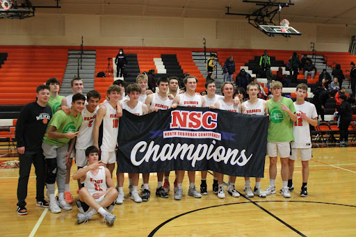 The team celebrates their hard-earned success with a group photo, holding the banner that signifies their conference title. For the first time in over 30 years, Libertyville claimed sole victory as conference champions.