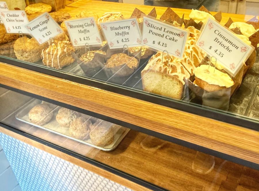 Fresh baked goods line the shelf at Hewn Bakery located at 348 North Milwaukee Ave. in Libertyville. An assortment of baked goods include blueberry muffins, lemon ginger scones, and sliced lemon pound cake.