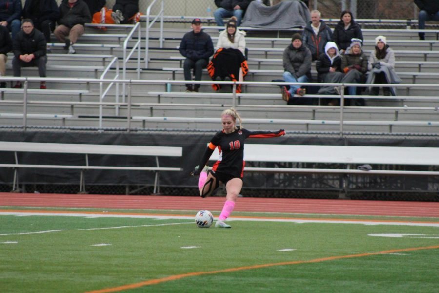 Senior Pru Babat (10) fires the ball. Babat plays defense for the Wildcats and has been on the team for 4 years. She is currently one of the team captains. 