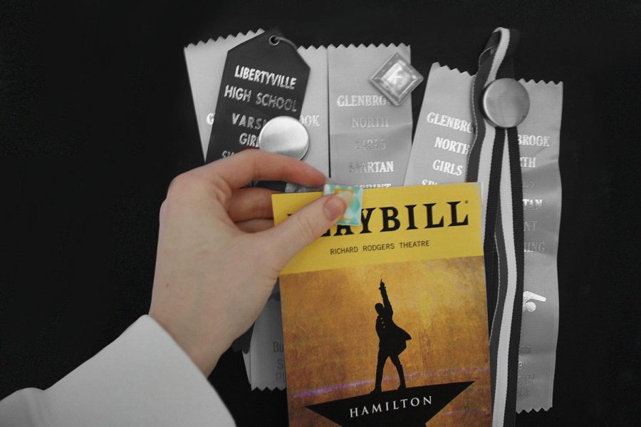 A theater Playbill crowds out soccer ribbons. Freshman Ella Globerger prioritized her future acting aspirations and dropped softball to pick up theater. It is ok to quit. Letting things go can open up new perspectives, and these perspectives make room for opportunities.
