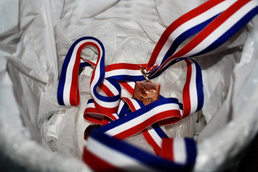  This track ribbon reflects a choice. Junior Amy Bermingham stopped playing soccer so she could join track. Studies show around 70% of athletes quit by the time they finish high school. You are not alone. 