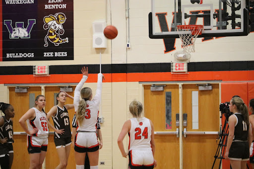 An example of a sports photo, courtesy of staff member Caroline Scott, that we took from the Girls Basketball game on Feb. 6, 2023. The photo was taken by a Canon 101 camera and was later published with the article on lhsdoi.com, our online newspaper.