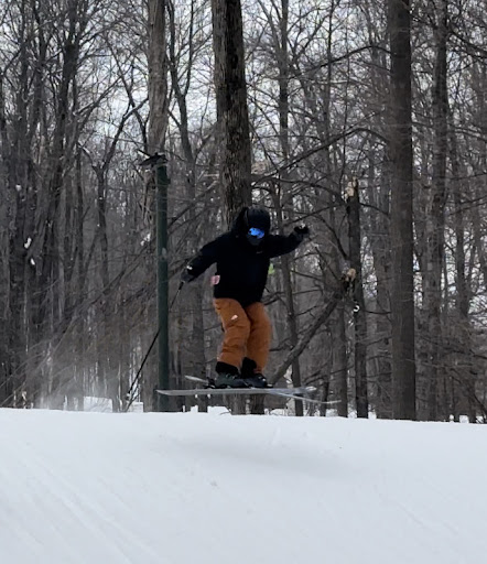 Senior Scott Criel gets air from a mogul at the January overnight trip to Granite Peak (photo provided By Sarah Kelly.)