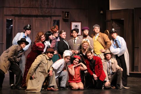 The full cast of “Clue” pose for a picture at the end of their performance.