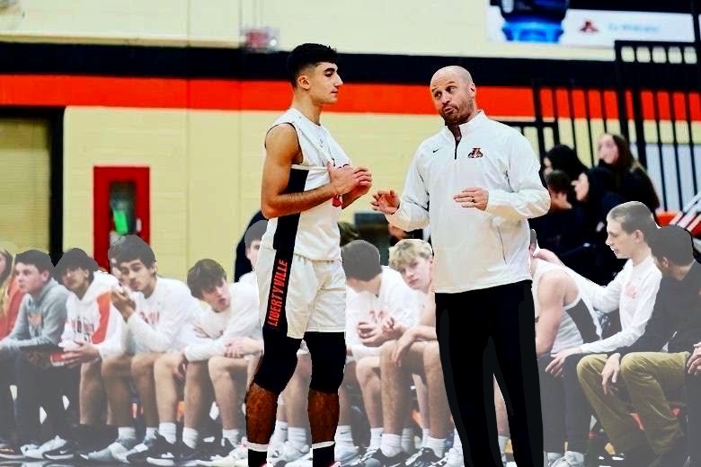 Varsity coach Brian Zyrkowski speaks with junior Jacob Bahrani mid- game. Bahrani will fill in the shoes of graduating seniors on the basketball team.