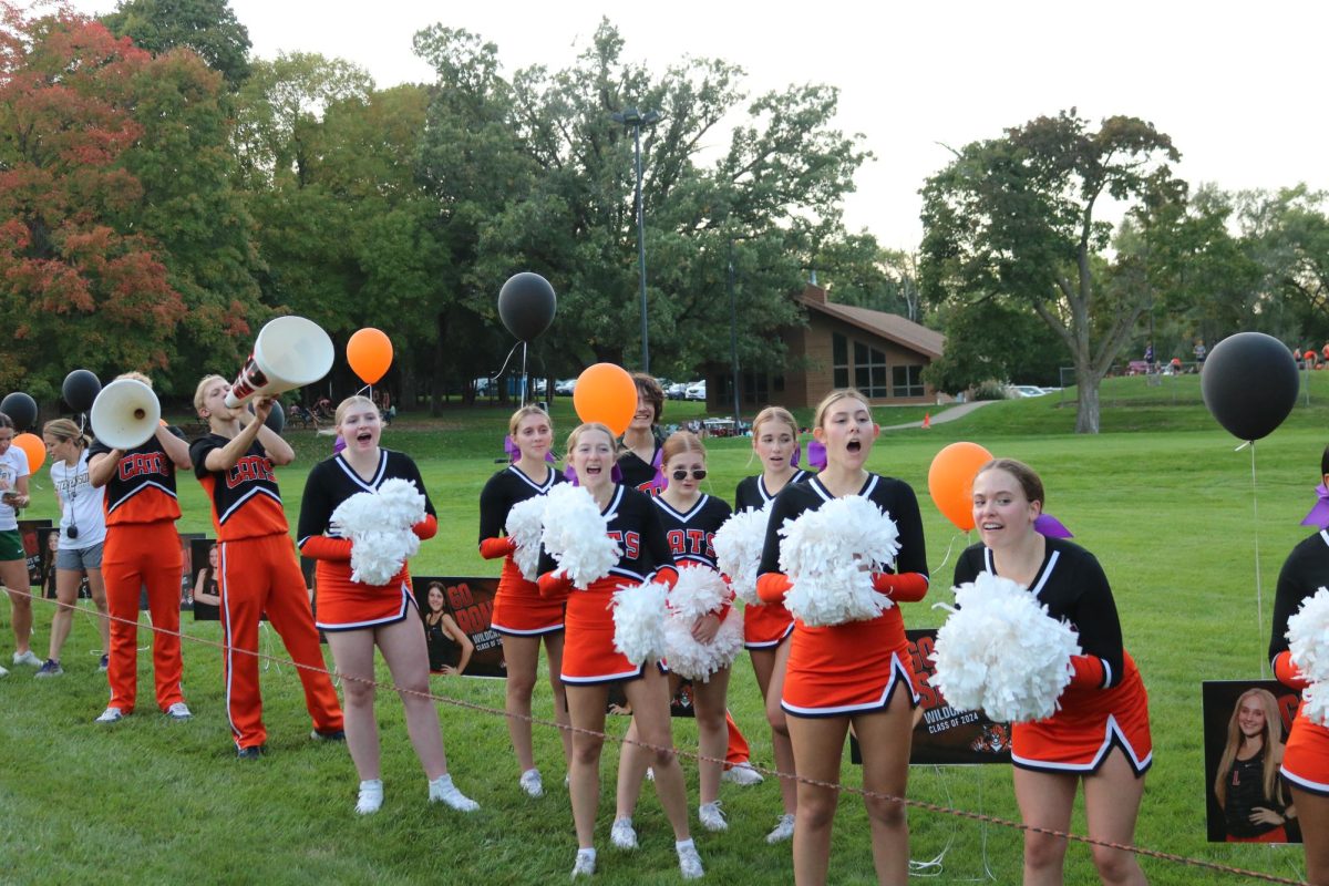 Libertyville’s varsity cheer team encourages the runners as they approach the finish line. With senior night being a celebrated tradition for athletics, many senior runners from both teams had strong finishes, such as senior Margo McGormley in first for the girls.