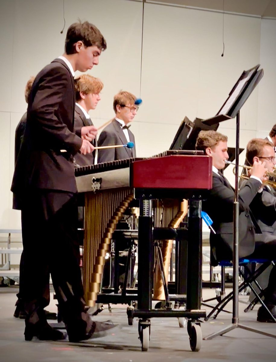 The percussion section,  behind the wind instruments, focuses on providing a steady rhythm to further develop the ideas of hope in the “Hymn of US.” 