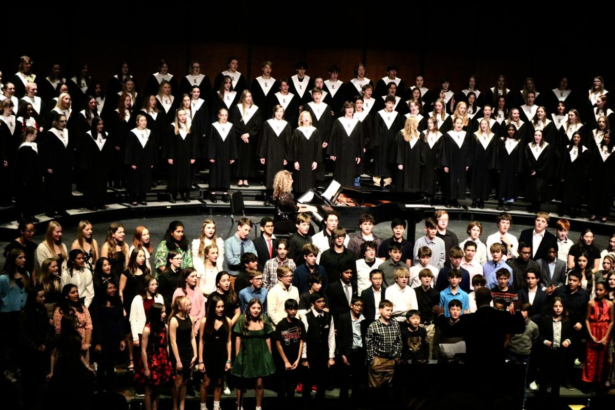 Choir students from, Highland, Rondout and Oak Grove joined the LHS Choirs as they performed their last two songs, “SING” by Pentatonix and “Hey Jude” by The Beatles. The combined ensemble was conducted by Dr. Paul Nielsen, a music educator at the middle school, high school and university level for over 30 years. Dr. Nielsen worked with this combined group during the day, when middle schoolers arrived for the annual festival. “We spent all day trying to get everything to be performance ready for tonight,” Dr. Nielsen said. “First and foremost, [our goal was] to have a whole lot of fun.”
