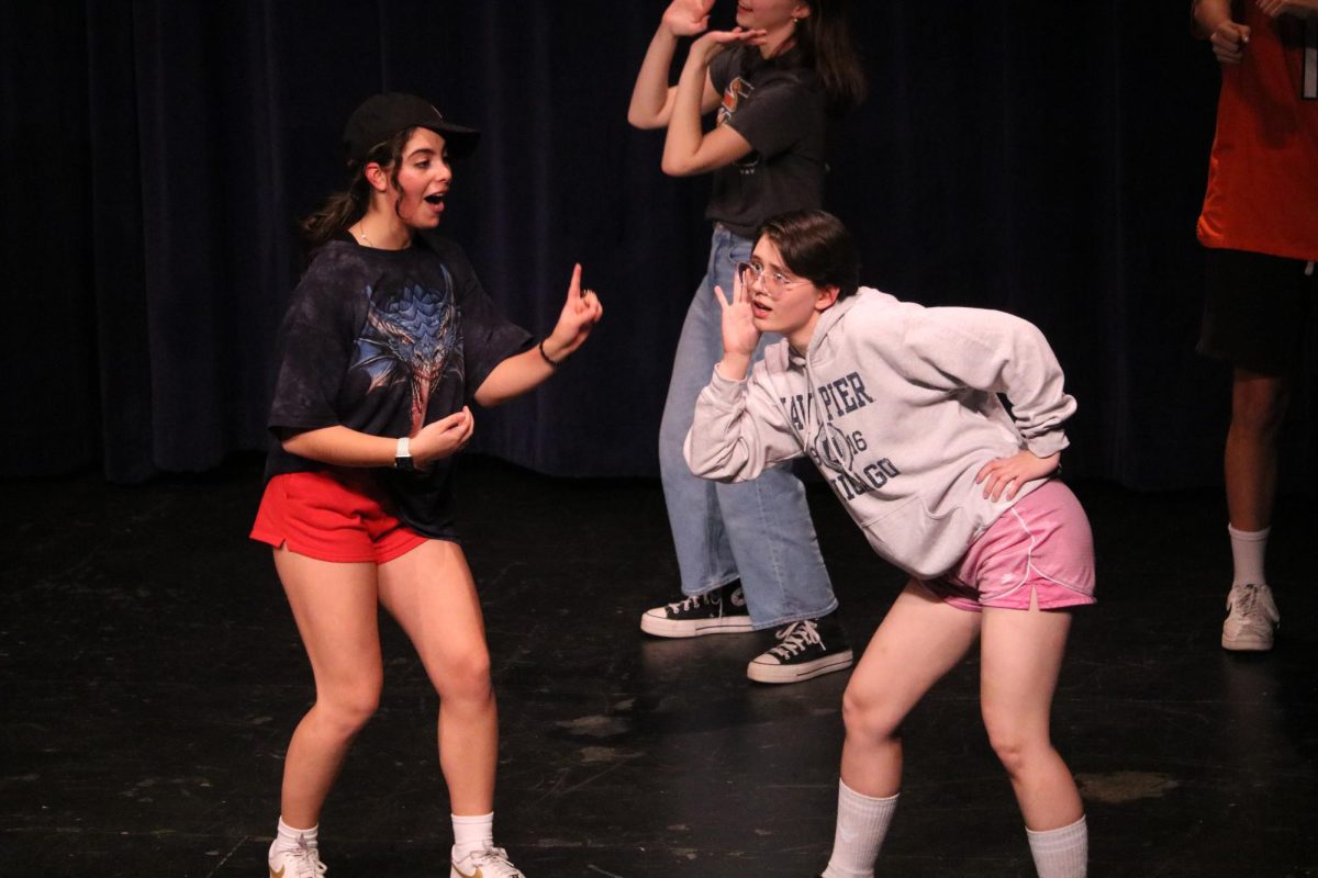 Debbie, played by junior Isabella Abou Chakra, confesses her feelings to her crush Joneigh, senior Elm Houglum. However, she is met with the unexpected realization that he is gay. “My favorite part about the [skit] was when I got to run [in]to the audience and start sobbing on someone,” said Abou Chakra. “Last night I got held by this beautiful old lady and today I got to talk with [someone] about gay people and being heartbroken over them”