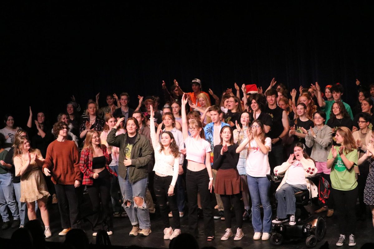 The full company of One Acts gathers for a final bow at the end of the show. With the directors in front, they all celebrate both their work and the seniors.